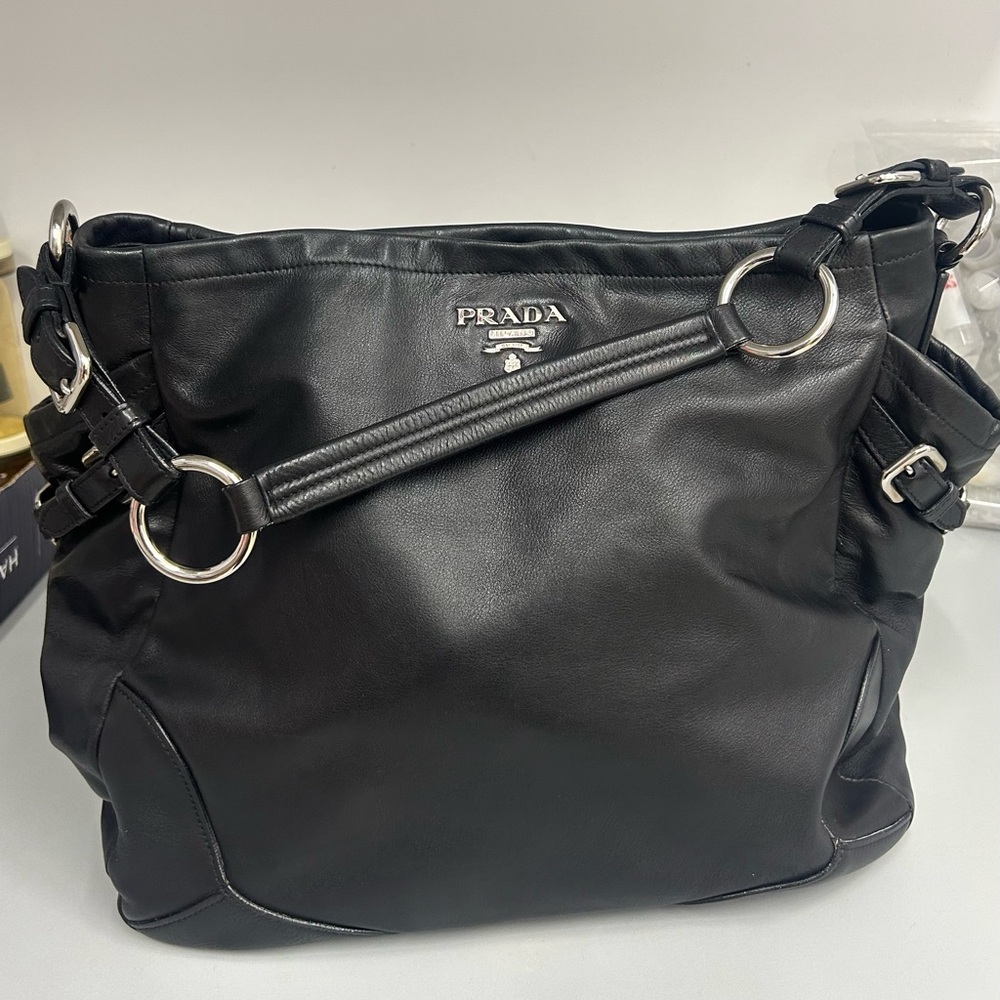 Preloved Prada soft calf leather hobo bag with two outer pockets